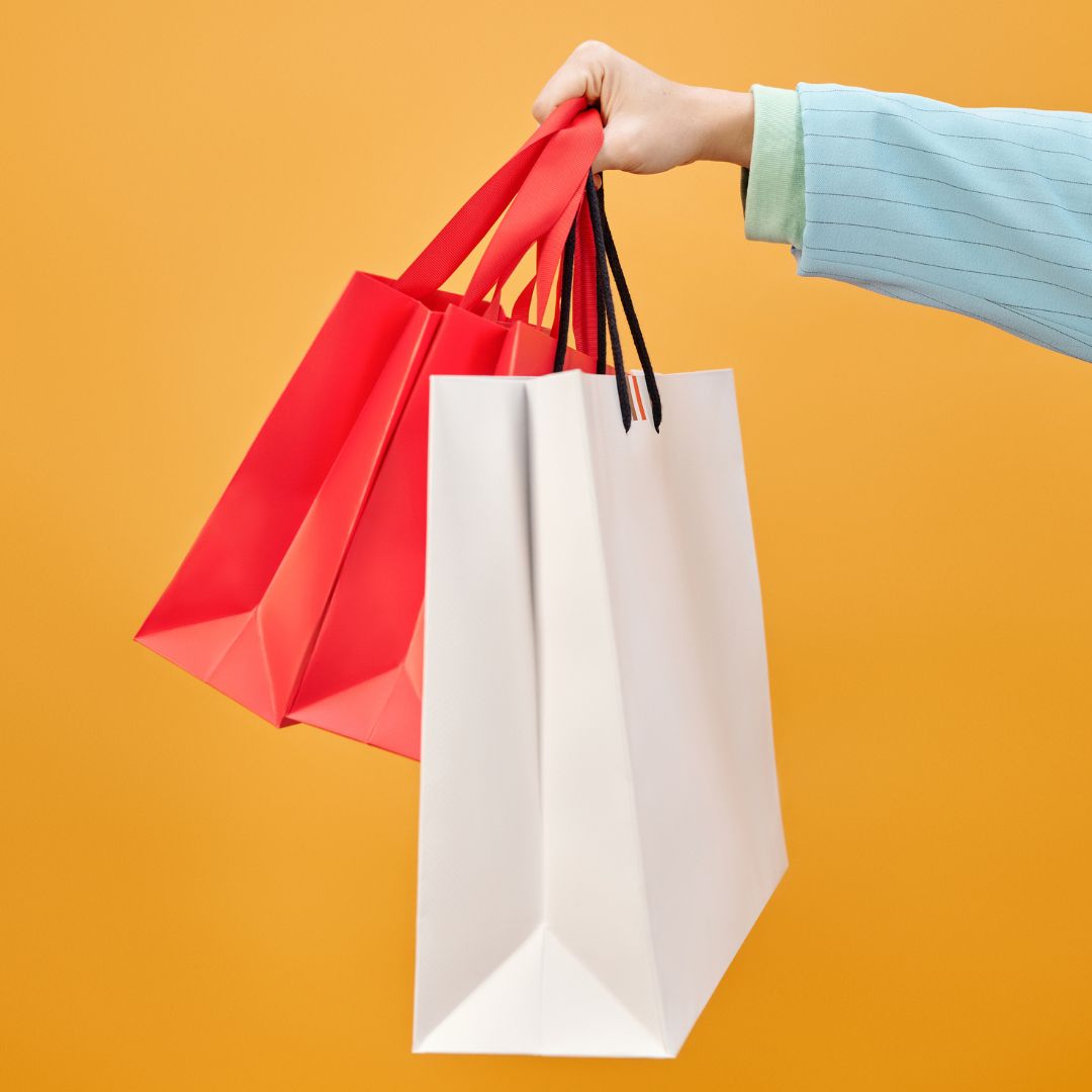 A collection of kraft paper packaging used by sustainable brands switching from plastic.